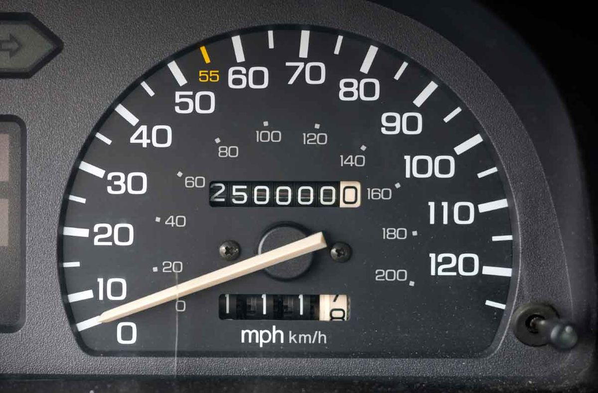 High-mileage car odometer showing 200,000 miles